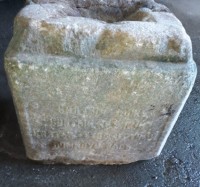 На дне Выйского пруда найден могильный камень XIX века с высеченной молитвой на старославянском языке (фото)